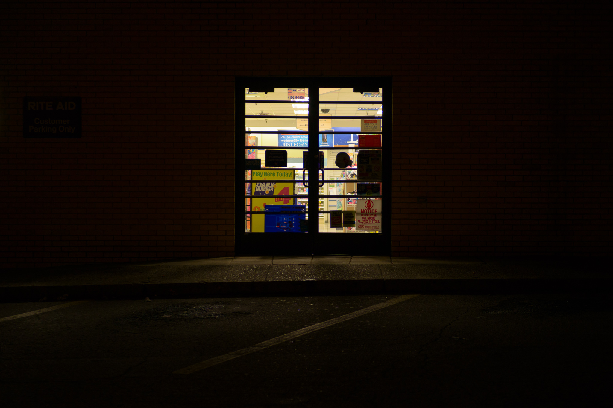 Entrance to drug store at night