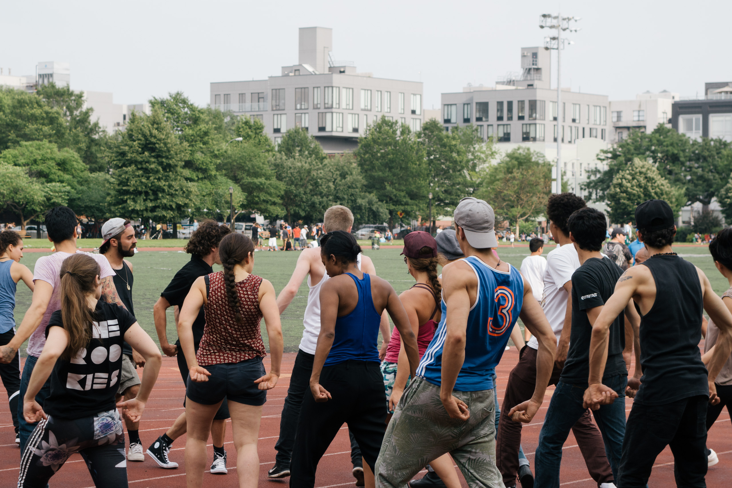 Dancers working to learn a routine