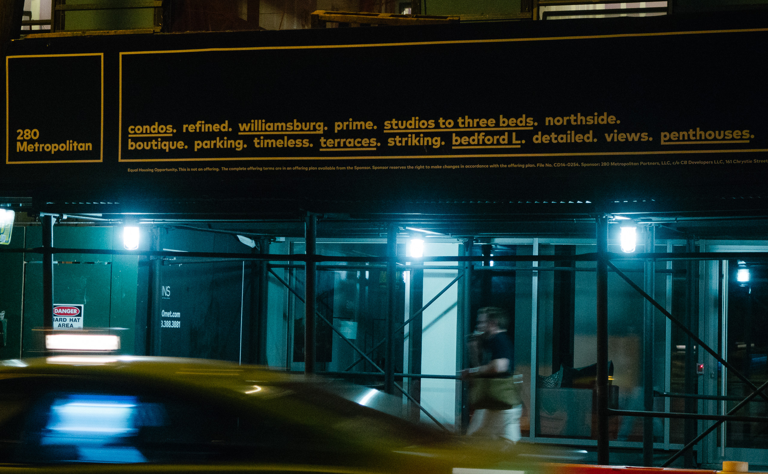 Scaffolding and advertising at 260 Metropolitan Ave