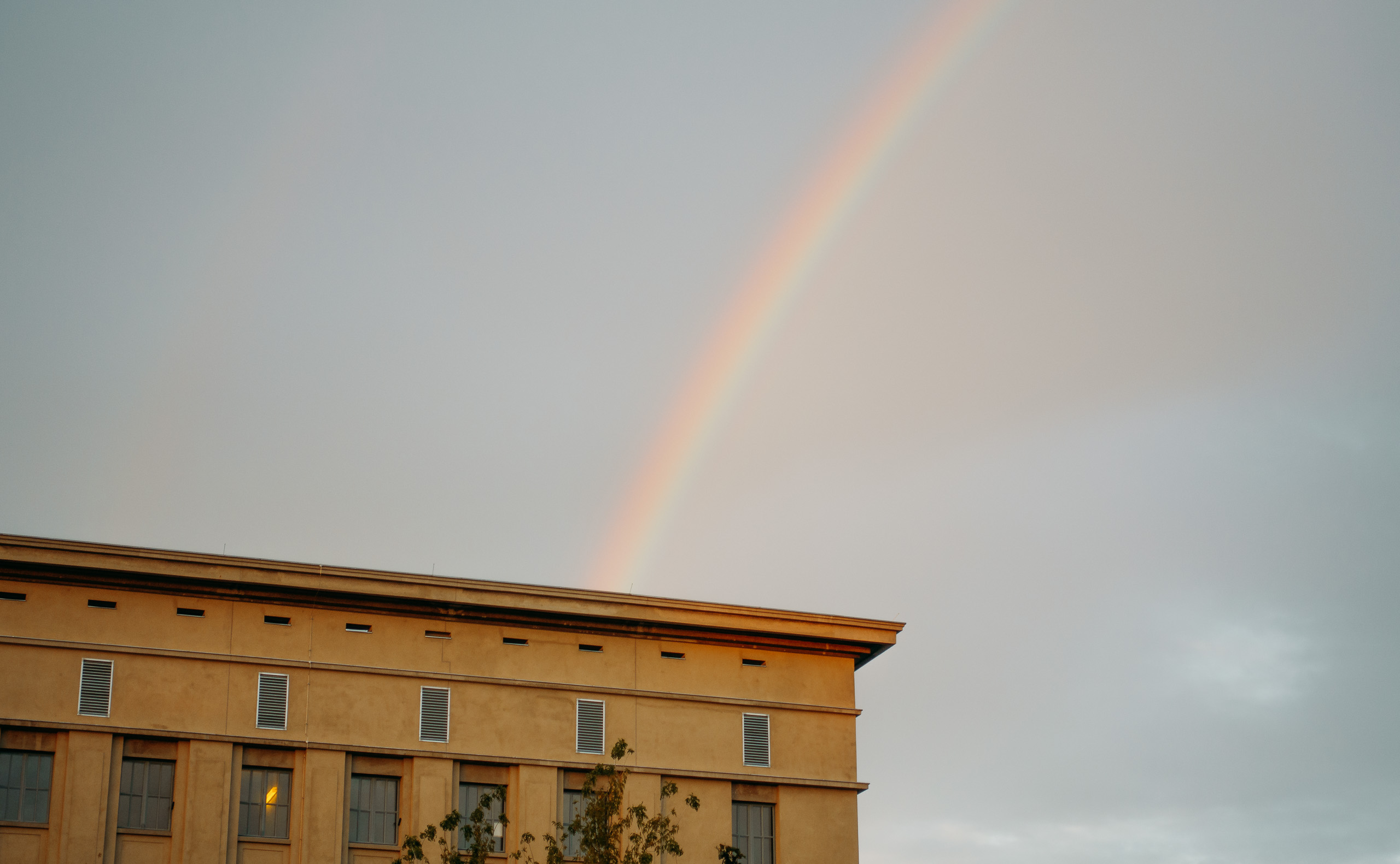 A rainbow over and into or out of Berghain in Berlin