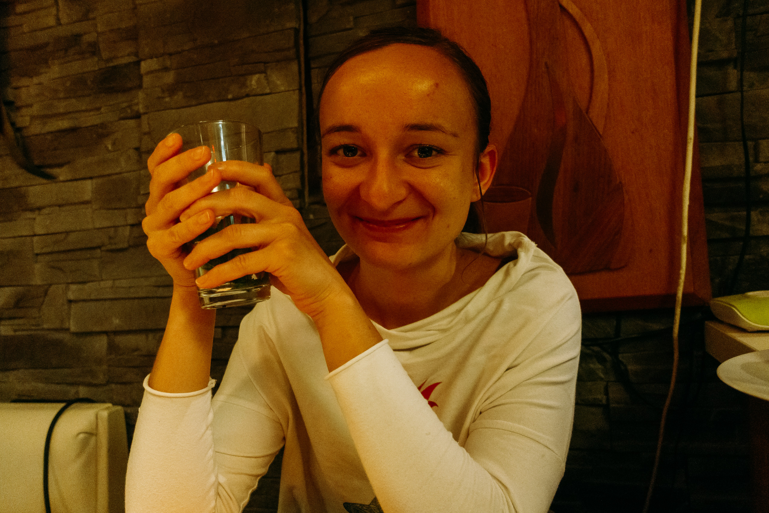 Teresa at a table of thali