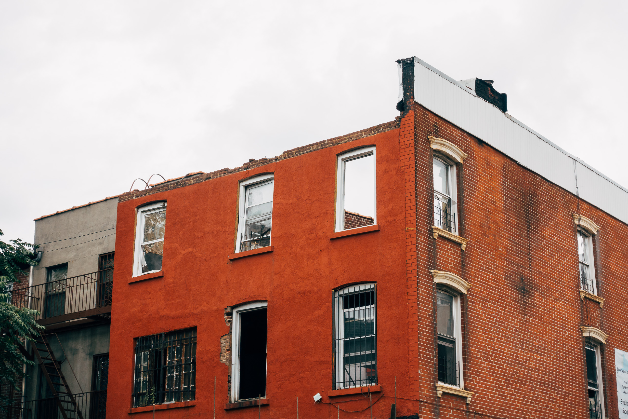 The shell of a brick house in Bed-Stuy, awaiting renovation