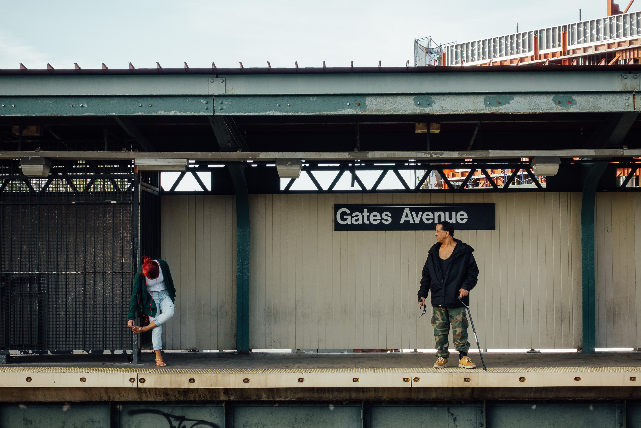 Young Girl and Leering Older Man at Gates Ave Brooklyn