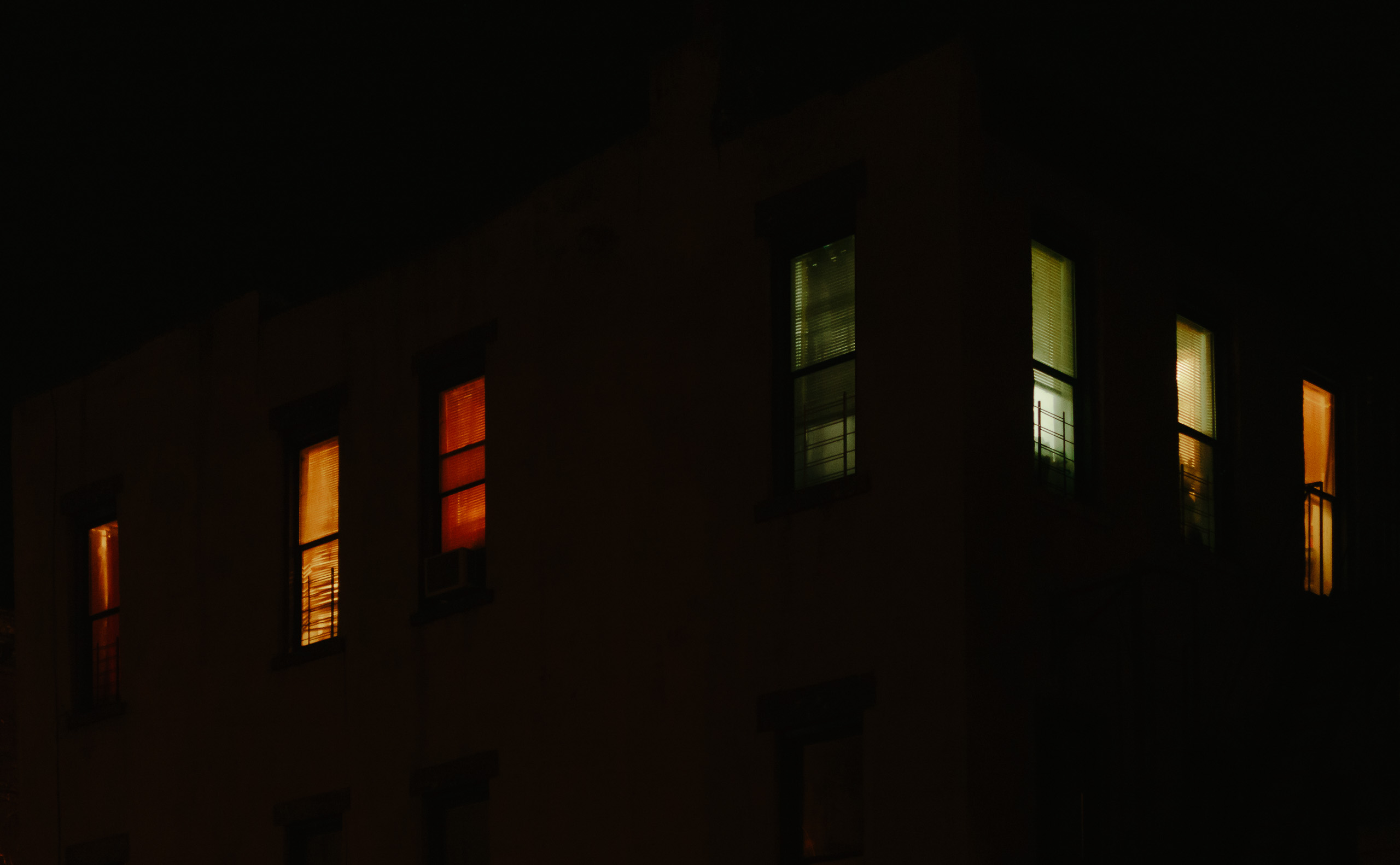 Neighbors in the night on Quincy Ave. in Bed-Stuy.