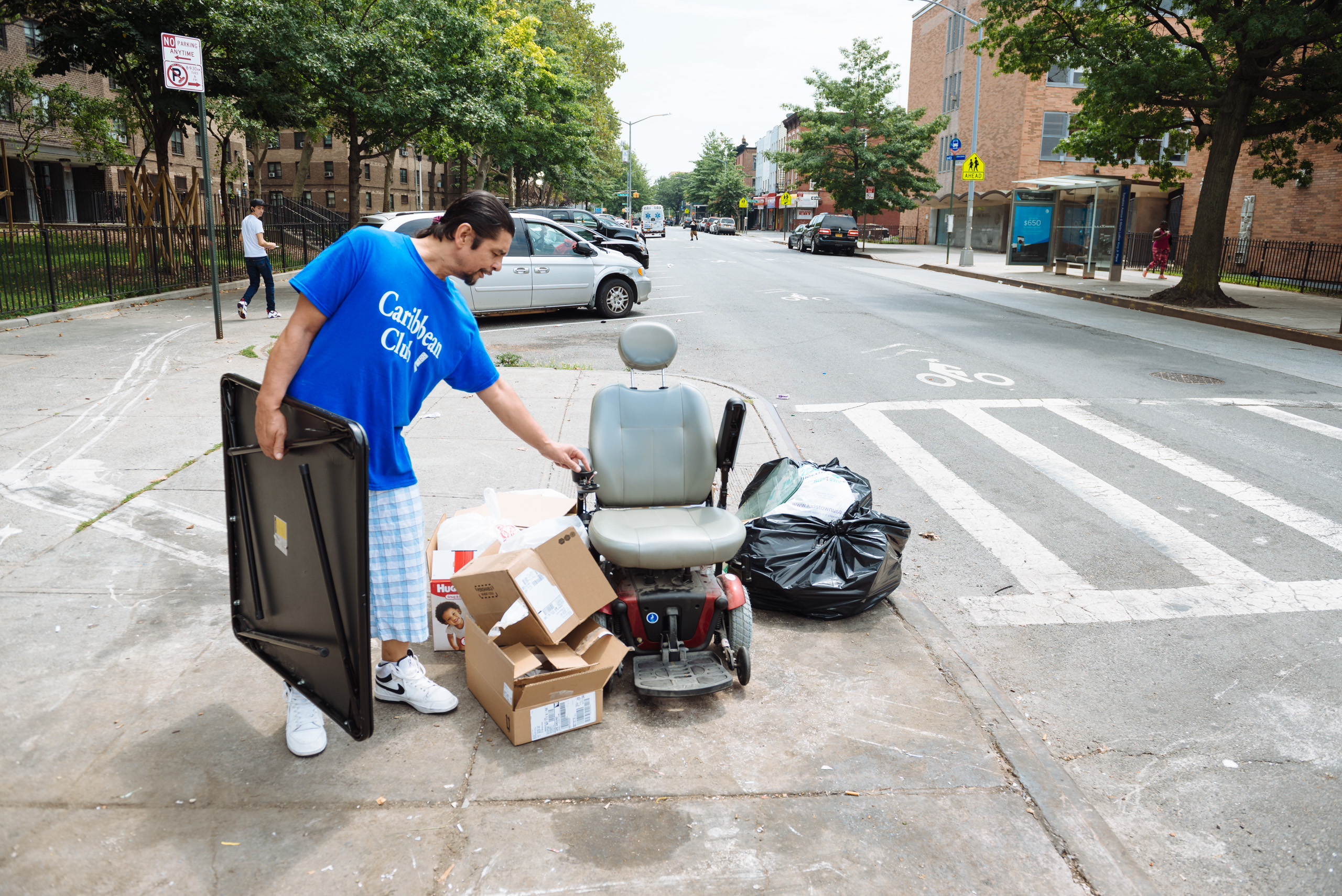 An electric scooter among other garbage