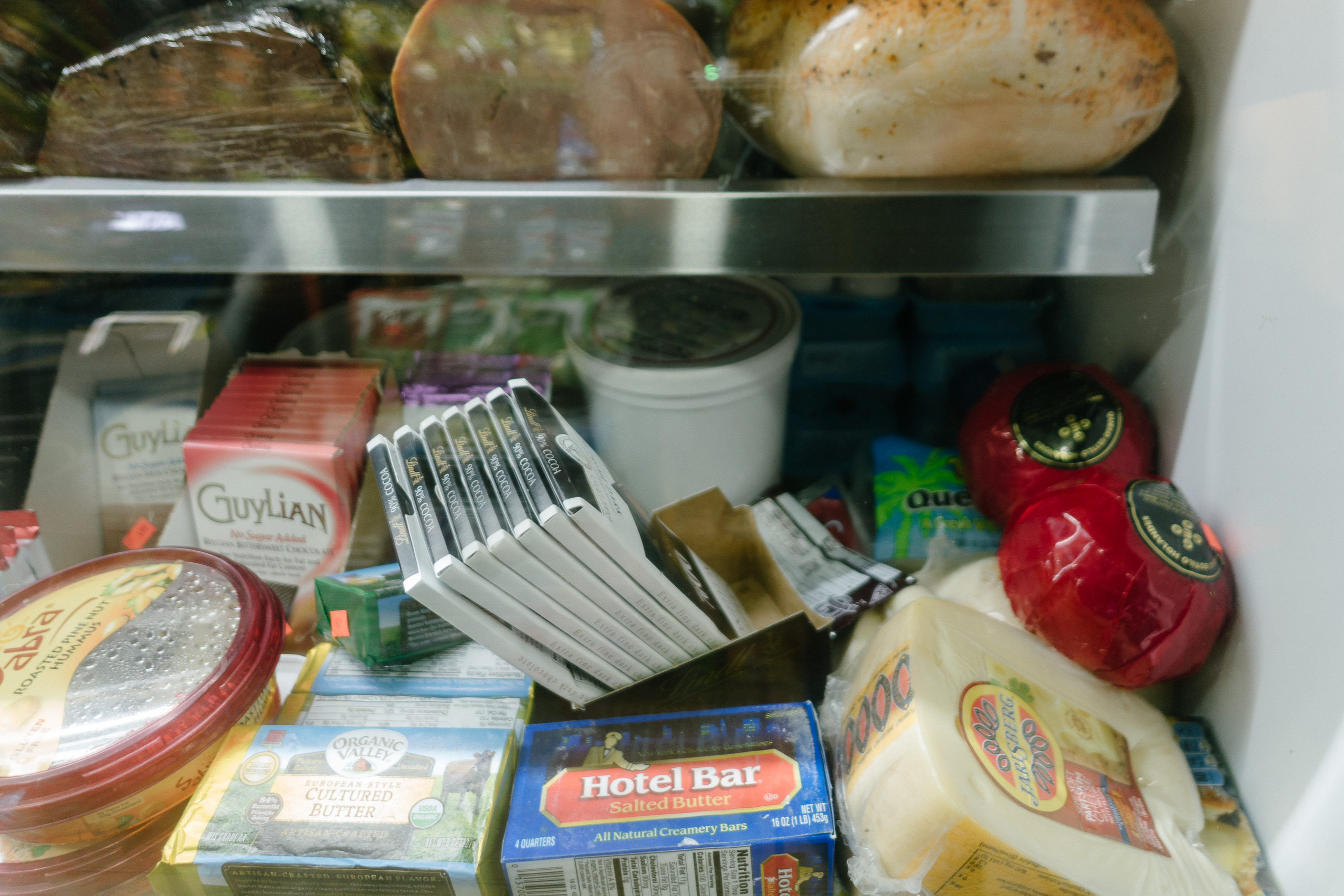 Chocolate bars in a deli meat cooler