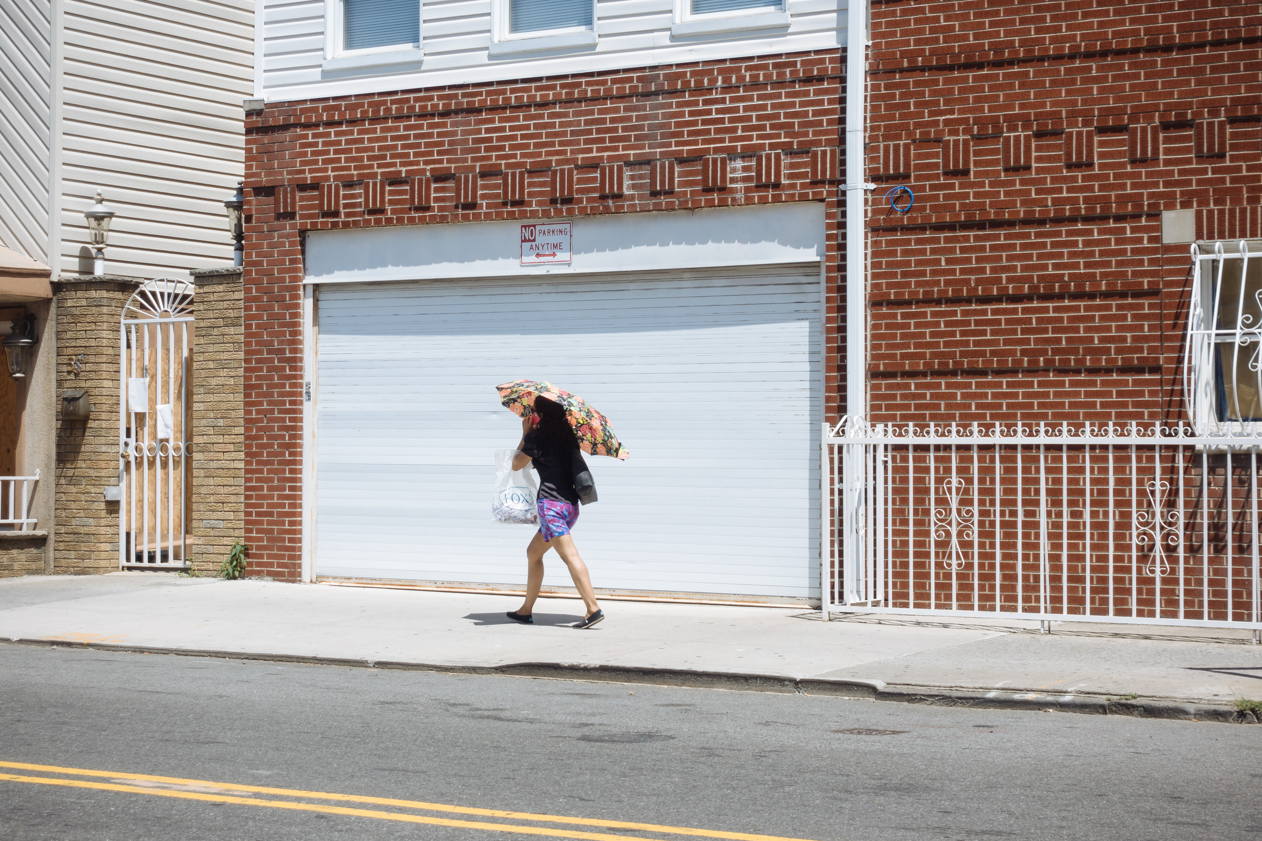 Woman with shade umbrella