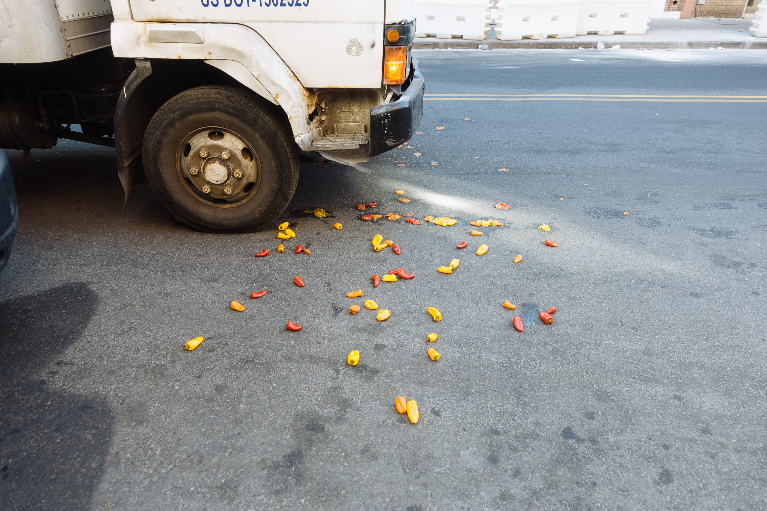 Box truck near pepper carnage.