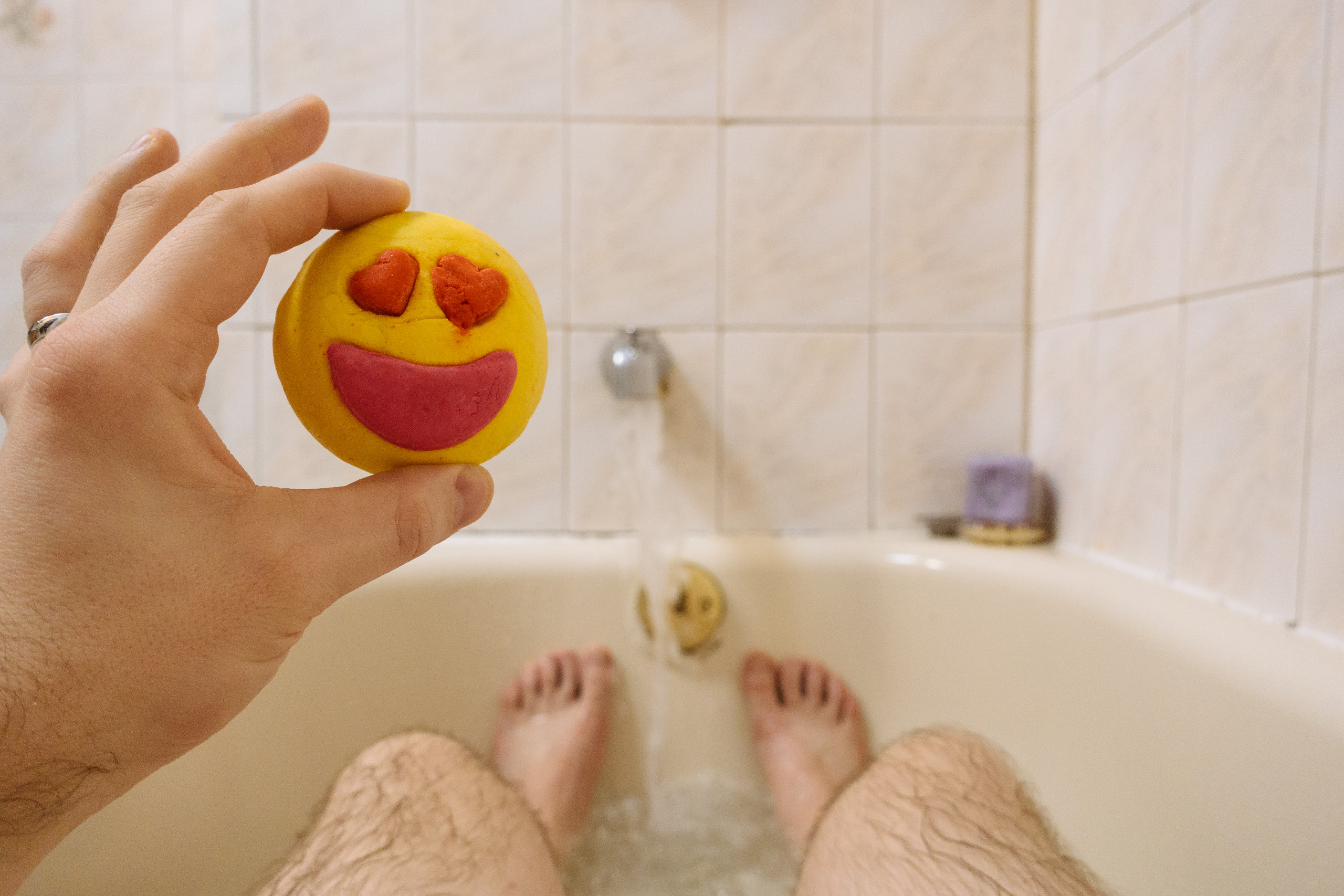 Bathtub with smiley bath bomb