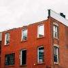 The shell of a brick house in Bed-Stuy, awaiting renovation