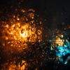 Rain on the window, focal point on the glass