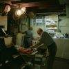 elderly couple carving deer in basement of wexford pittsburgh pennsylvania