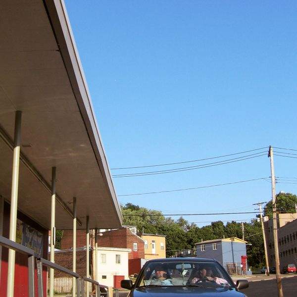 two obese people in a subaru in lawrenceville