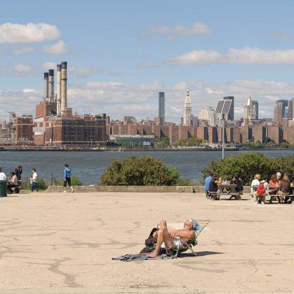 tanning old man east river state park manhattan skyline
