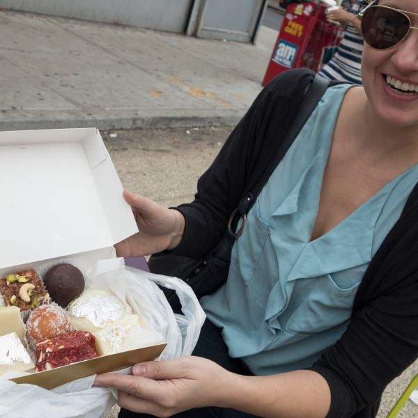 blond woman box of maharaja sweets