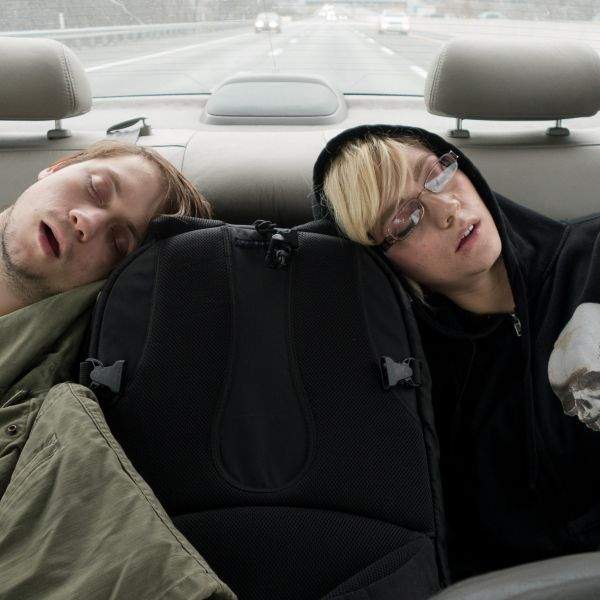 Dean and Brittany taking a nap in the back seat