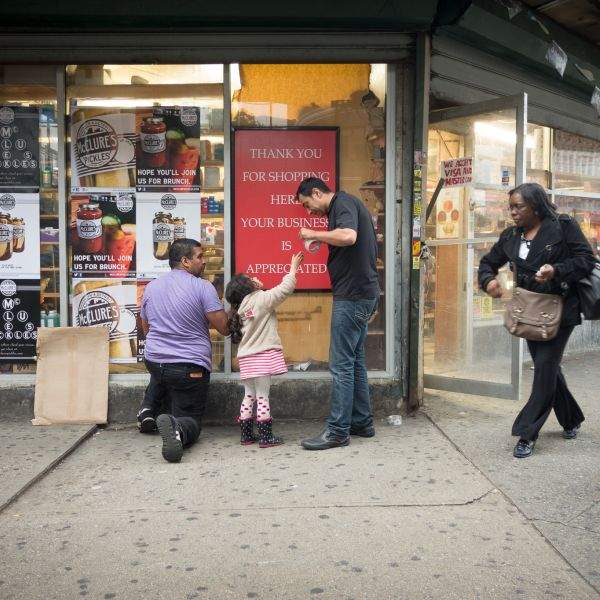 family hanging signage bodega