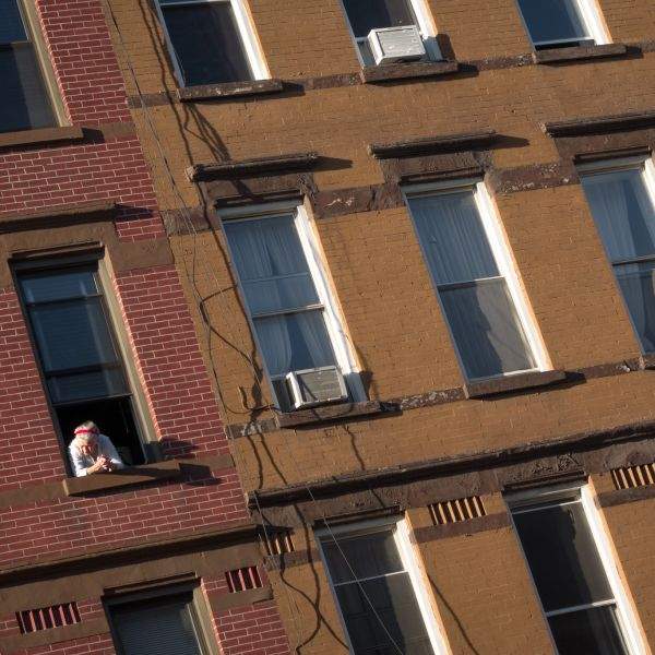 woman watching greenpoint avenue brooklyn