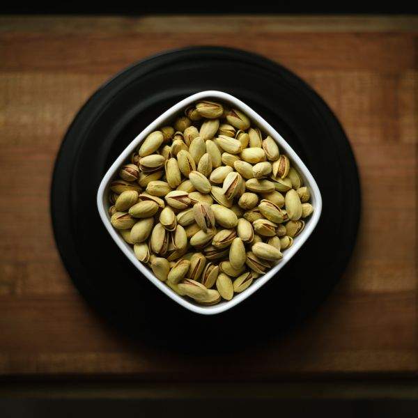 A bowl of Iranian Pistachios awaits consumption