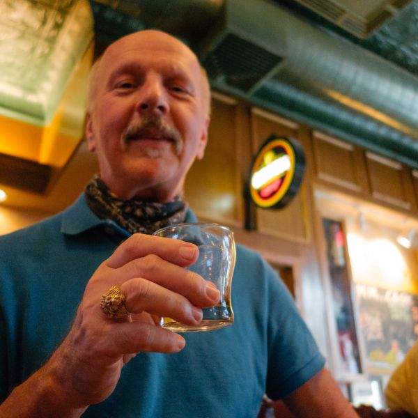 Pa hoists a glass