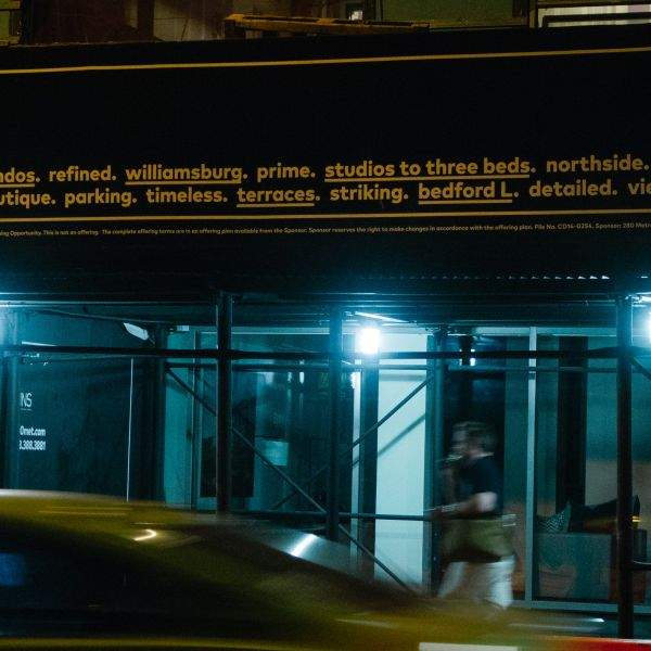 Scaffolding and advertising at 260 Metropolitan Ave