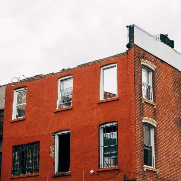 The shell of a brick house in Bed-Stuy, awaiting renovation