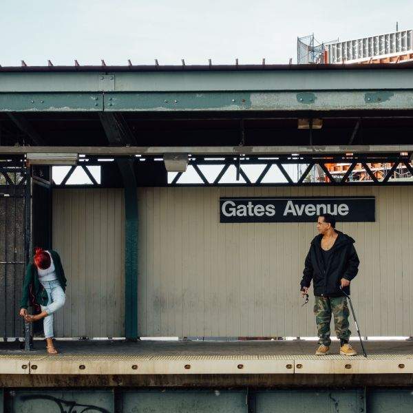 Young Girl and Leering Older Man at Gates Ave Brooklyn