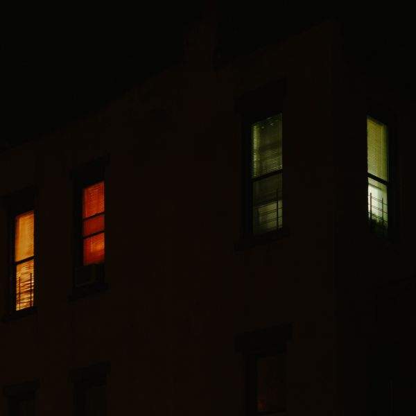 Neighbors in the night on Quincy Ave. in Bed-Stuy.