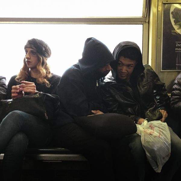 Commuters sharing secrets on J Train in Brooklyn Bed-Stuy
