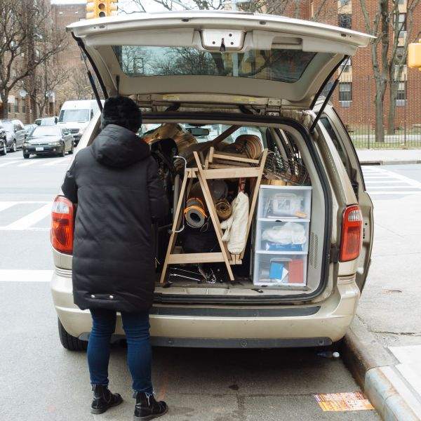 A borrowed van packed with Alessandra's belongings