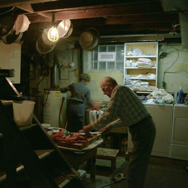 elderly couple carving deer in basement of wexford pittsburgh pennsylvania