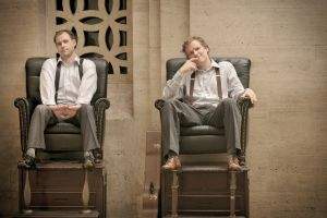 cash fur gold musicians posing at shoe shine stand in grand central station