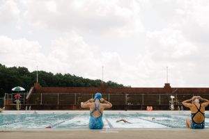 Ma puts on her swim cap.