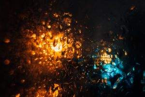 Rain on the window, focal point on the glass