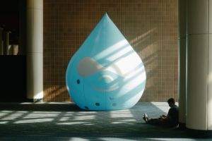Man catching a couple minutes at DrupalCon
