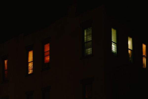 Neighbors in the night on Quincy Ave. in Bed-Stuy.