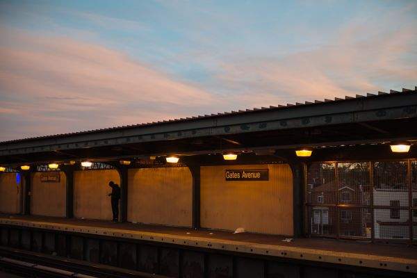 Rich colors over Gates Ave J stop at sunset