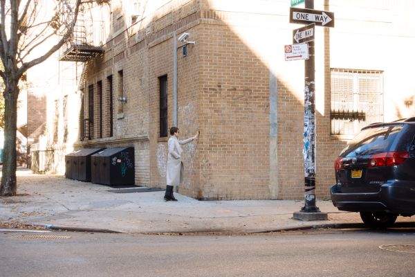 A woman has a conversation in Williamsburg, Brooklyn