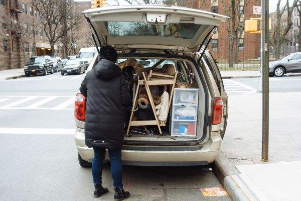 A borrowed van packed with Alessandra's belongings