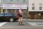 Hauling charcoal by skateboard Hauling charcoal by skateboard