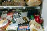 Chocolate bars in a deli meat cooler