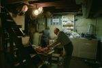 elderly couple carving deer in basement of wexford pittsburgh pennsylvania