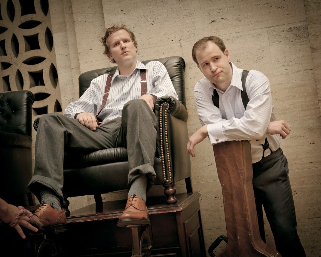 cash fur gold musicians posing at shoe shine stand in grand central station