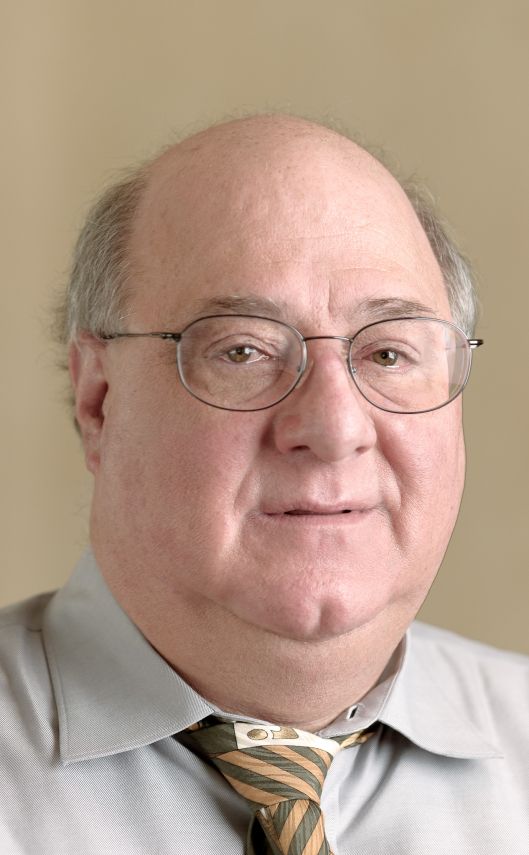 obese man bald bright light