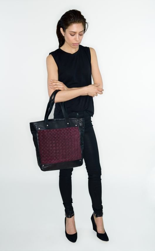 model with handbag