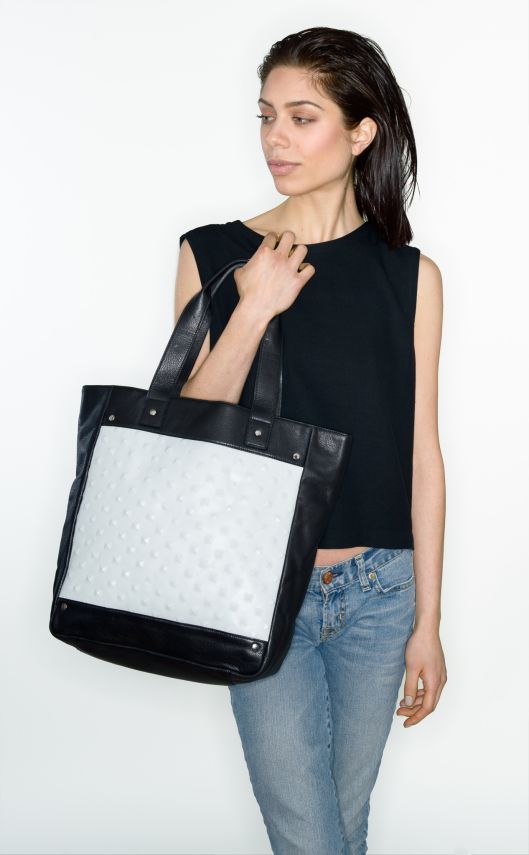 model with handbag