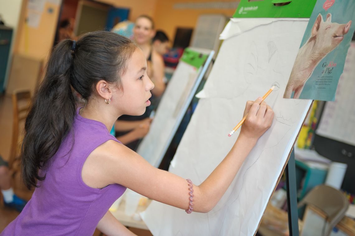 girl painting from photo