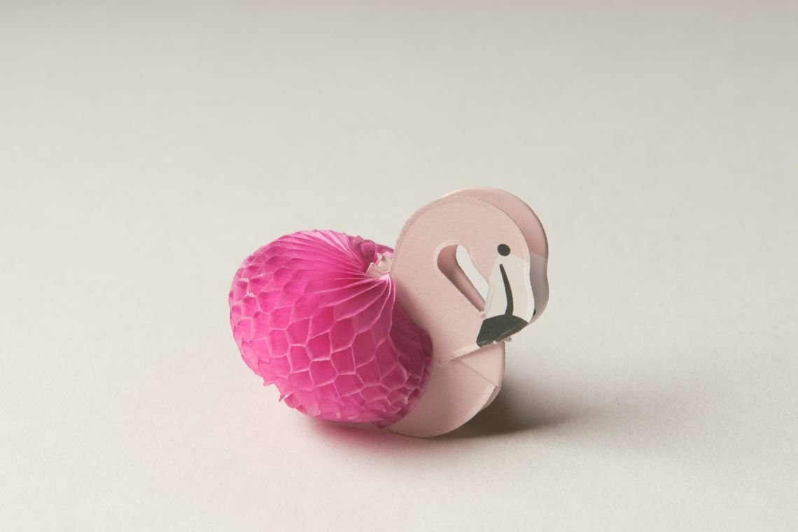 Pink Paper Flamingo on White Paper