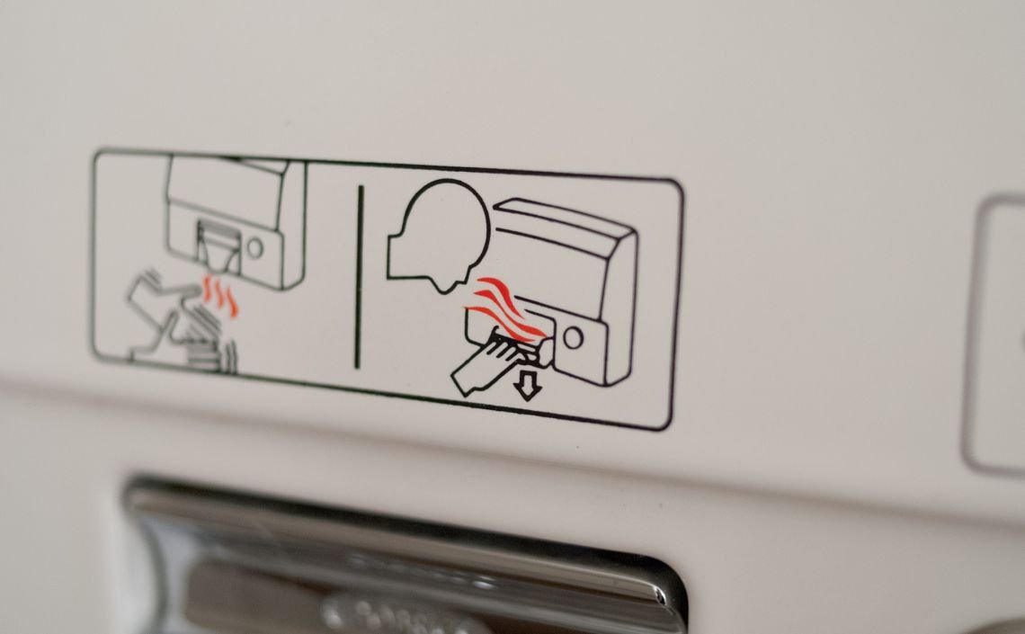 hand dryer for face at armory show bathroom