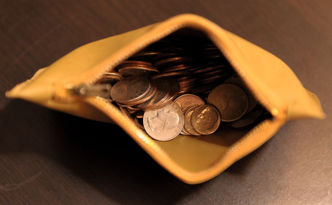 old leathery change purse
